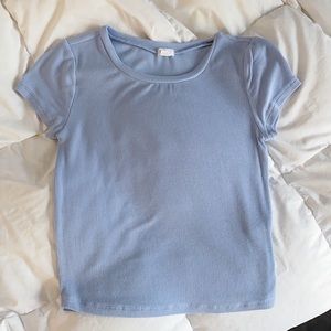 Light blue stormi tee, size small.